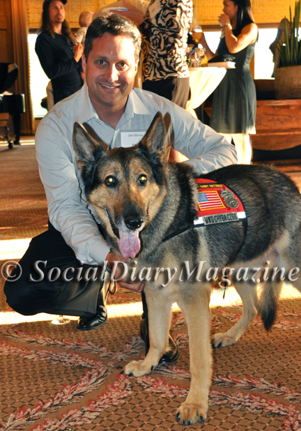 Jim Silvera of Rancho Coastal Humane Society with military rescue dog Chyba